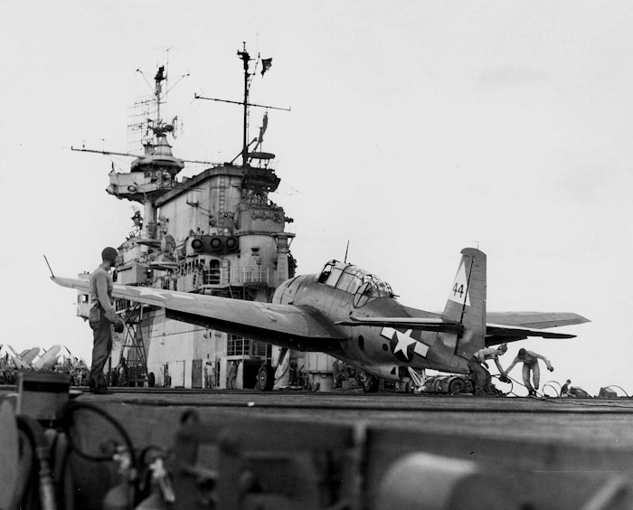 A TBM Avenger of Torpedo Twenty traps aboard USS Enterprise (CV-6) 10 October 1944