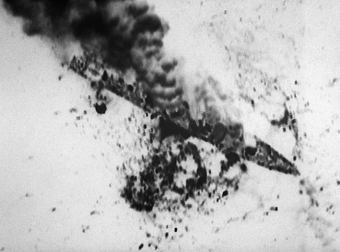 An aerial view of the Iranian frigate IS Sahand (74) burning on 18 April 1988