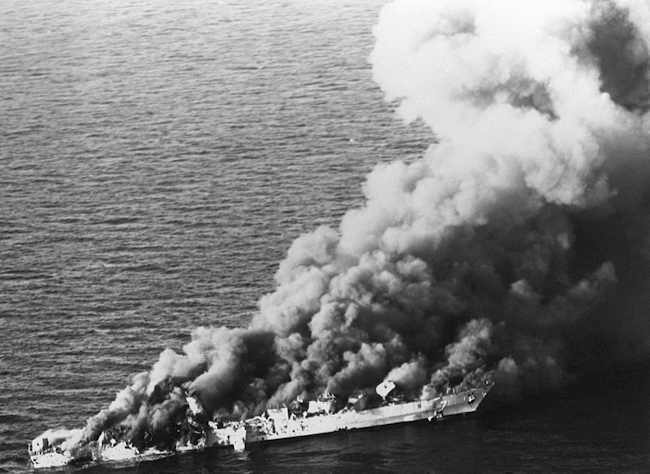 The IS Sahand (74) burns after strikes by U.S. Navy ships and VA-95 A-6E Intruder aircraft on 18 April 1988